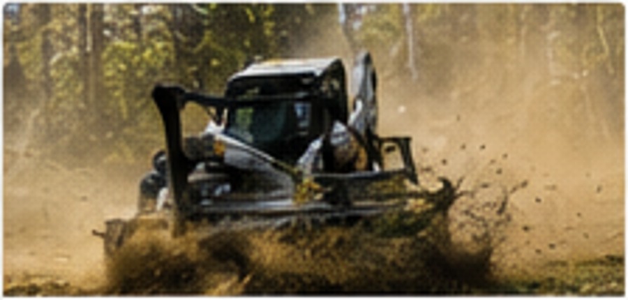 Forestry mulching machine clearing vegetation